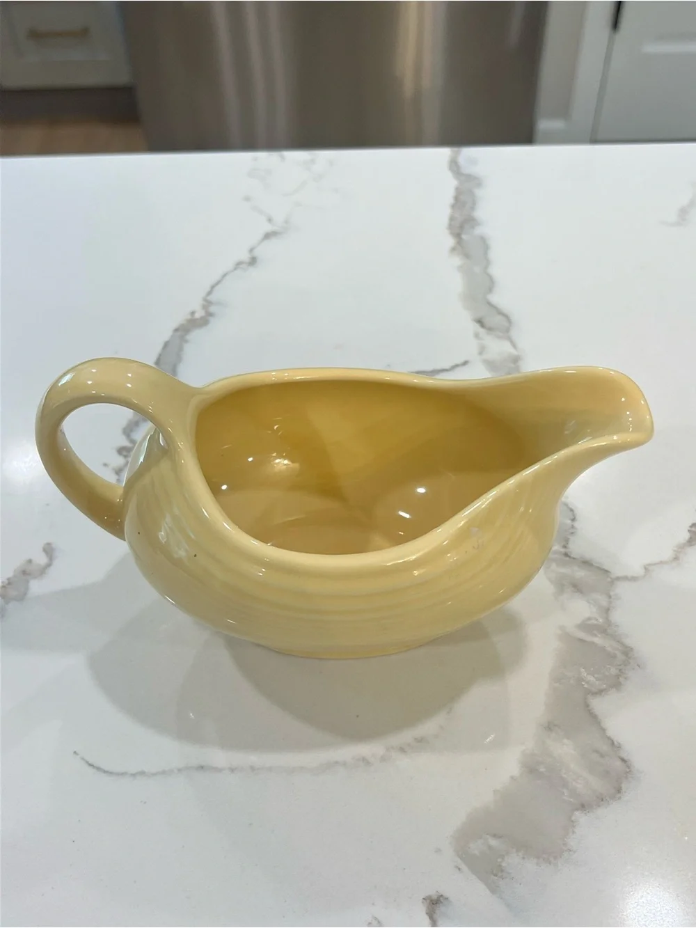 Vintage Fiesta Ware light yellow “sunflower” gravy boat EUC
